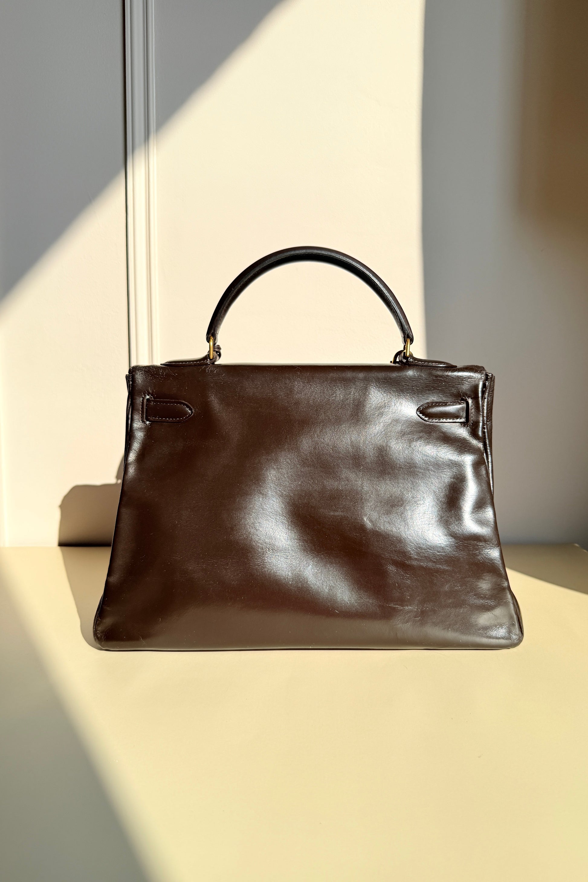 Sac kelly vintage Hermès marron derrière